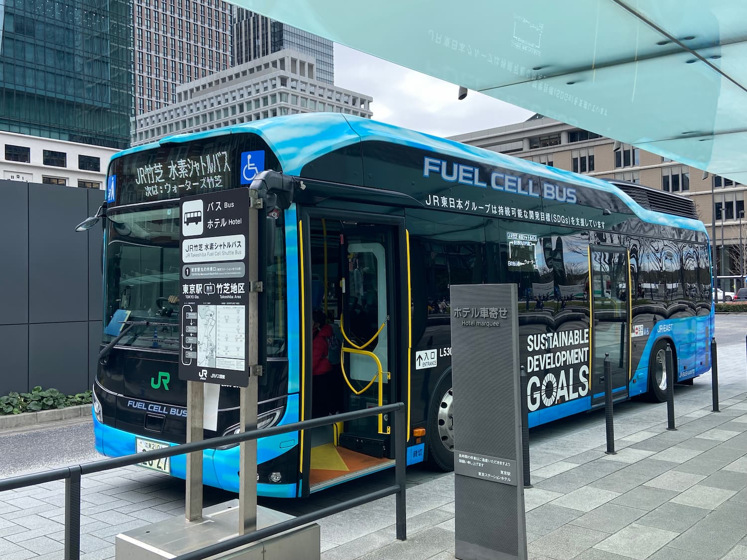 A Toyota SORA hydrogen fuel cell bus waiting for passengers in Tokyo.
